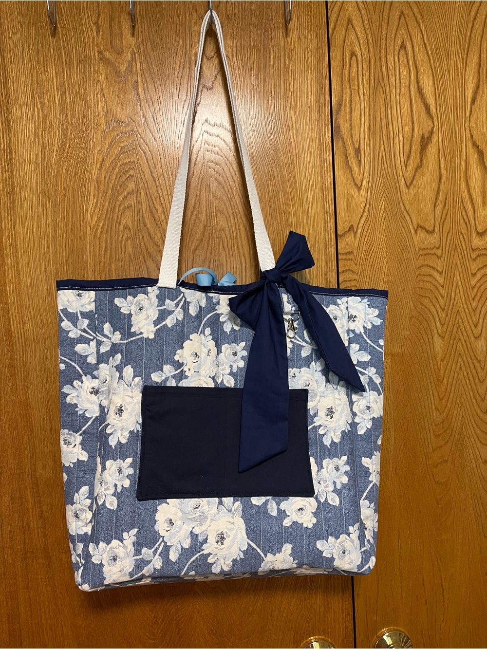 Floral Navy Tote with Cream Straps and Bow Accent